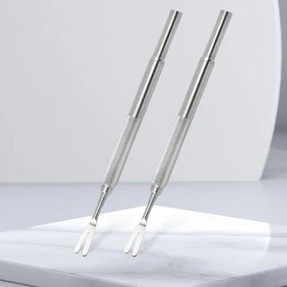 Pince a tique double