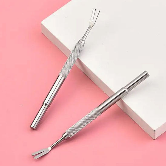 Pince a tique sur fond rose 