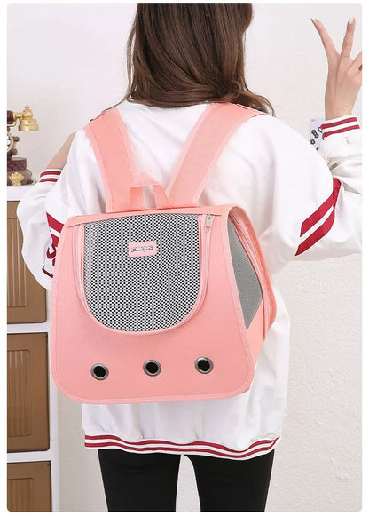 Sac a dos chat couleur rose avec trois trou porter sur dos